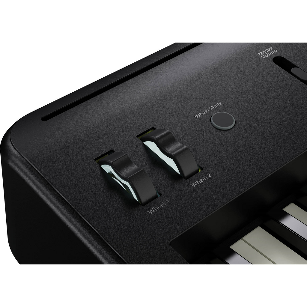 Black Roland FP-E50 entertainment piano with keys and control panel, perfect for stage and performance use.