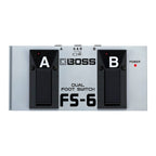 BOSS FS-6 dual footswitch for effects pedals, featuring two sturdy foot switches on a black rectangular base.