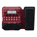 Zoom B1X Four bass amp modeler and multi-effects pedal showing its front panel with control knobs and input/output jacks.