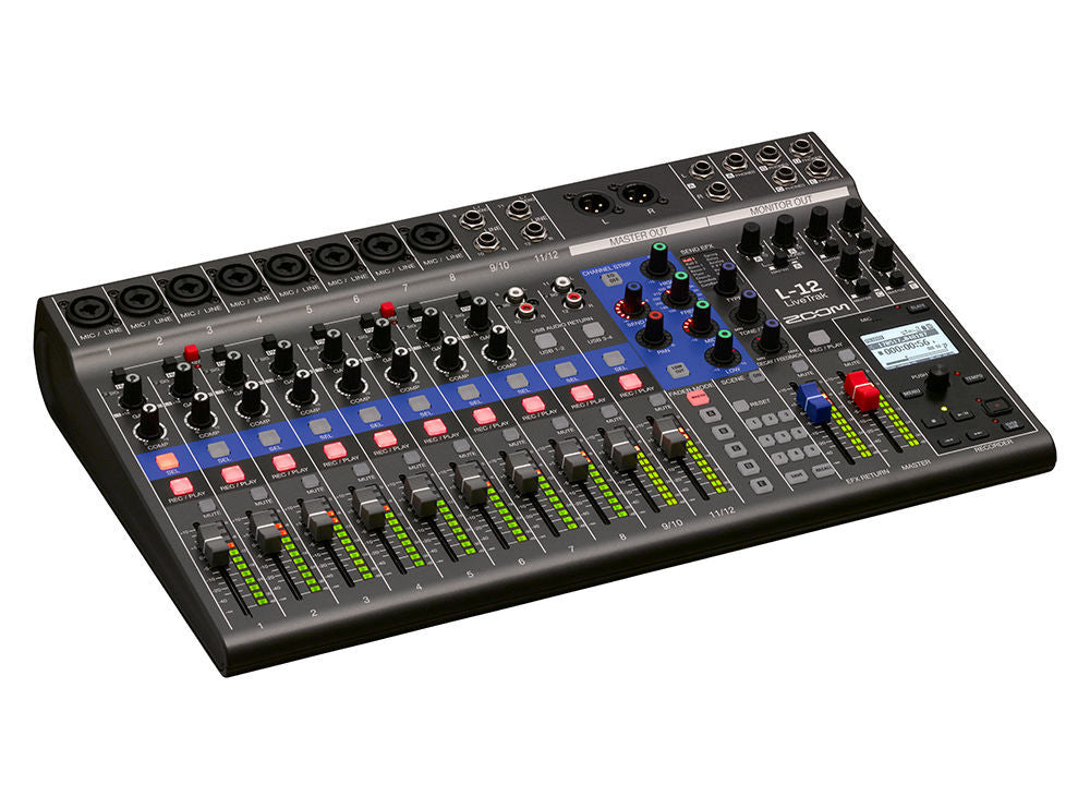 Zoom Livetrak L-12 digital recorder with multiple input channels and control knobs in a professional audio setup.