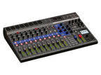 Zoom Livetrak L-12 digital recorder with multiple input channels and control knobs in a professional audio setup.