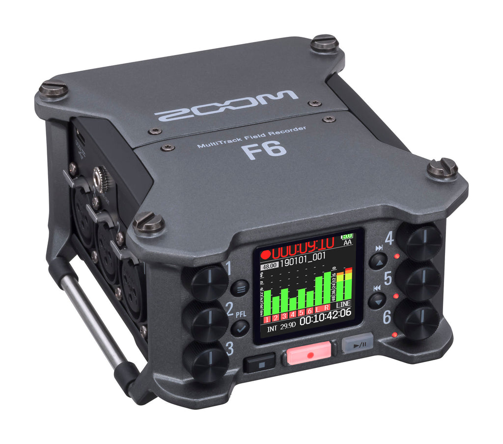 Zoom F6 digital field recorder with multiple input jacks and control knobs, designed for professional audio recording in outdoor settings.