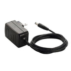 Zoom AD-16 power supply adaptor for digital recorders, shown connected to a Zoom device in a close-up shot.