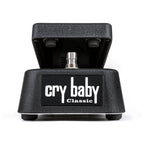 Dunlop Cry Baby Classic effects pedal with footswitch and control knobs on a pedalboard for guitar effects.