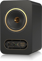 Tannoy Gold-5 5-inch studio monitor speaker showing a sleek black finish and detailed driver components.