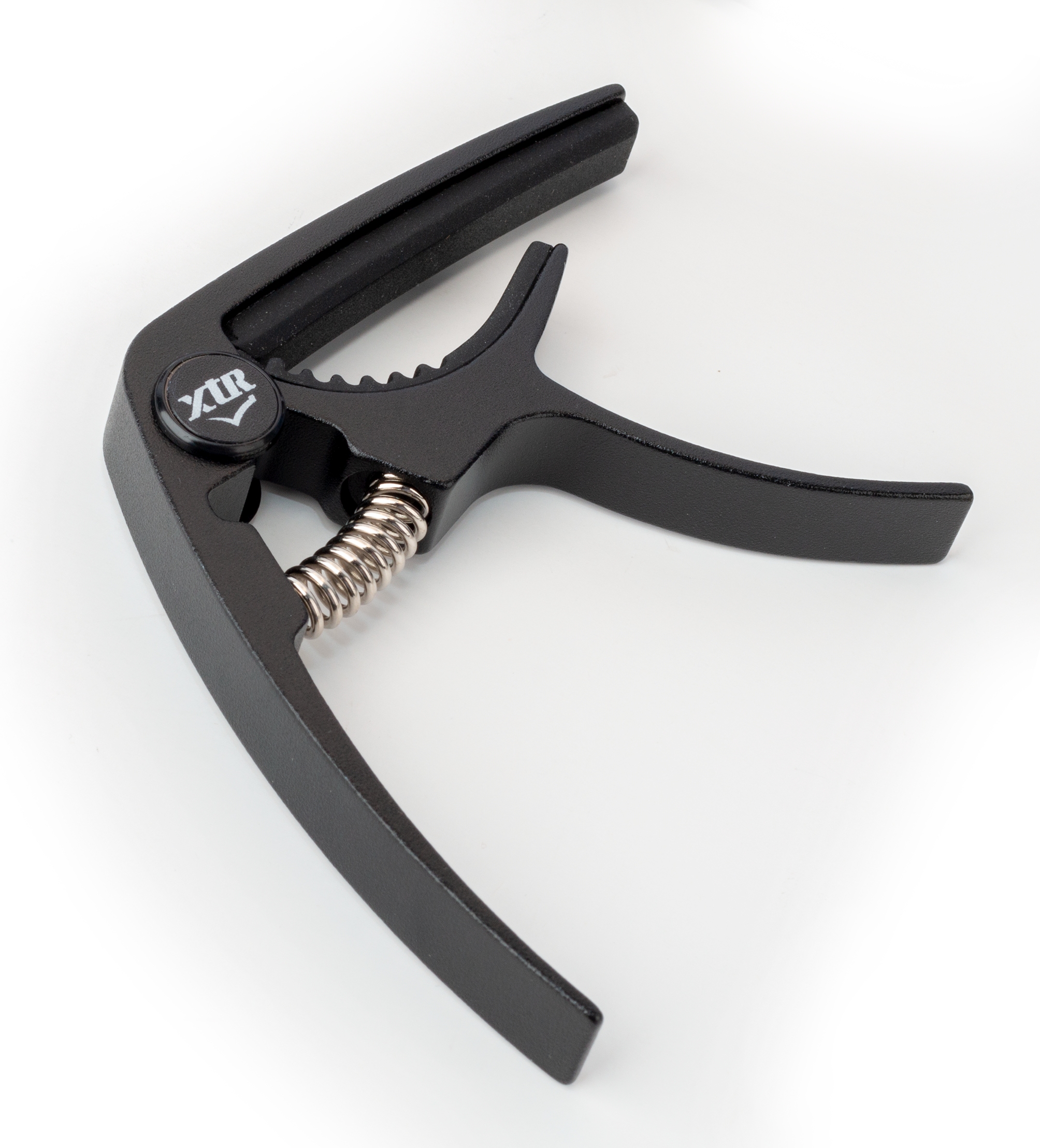 Black XTR GPX4CB trigger-style guitar capo on a guitar neck, designed for easy one-handed use and secure string pressure.