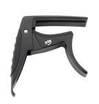 Black XTR Trigger Style Acoustic Guitar Capo resting on a guitar neck, showcasing its ergonomic design and secure clamp mechanism.