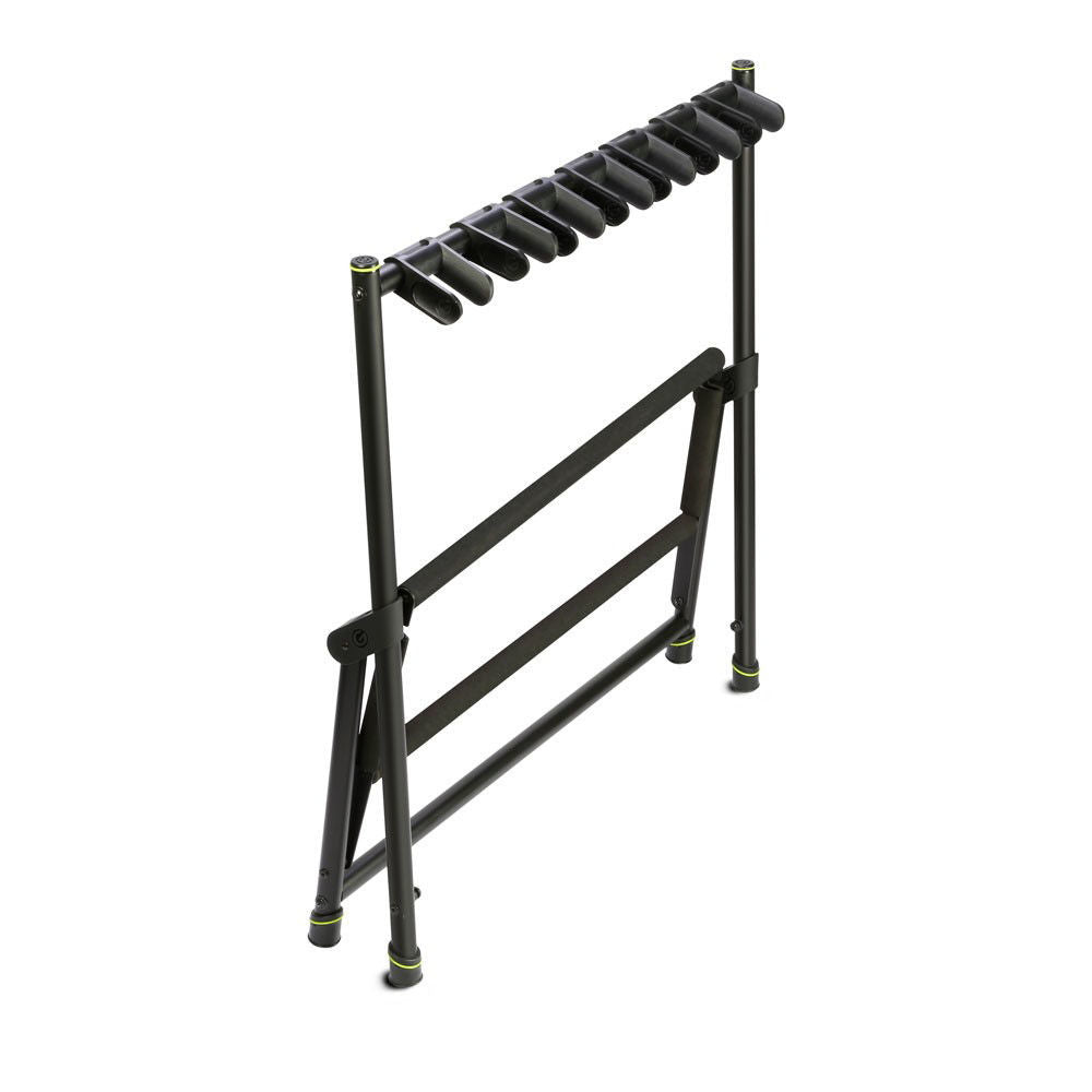 Gravity VARIG7 folding guitar rack holding seven guitars with padded supports and sturdy frame for easy storage and organization.