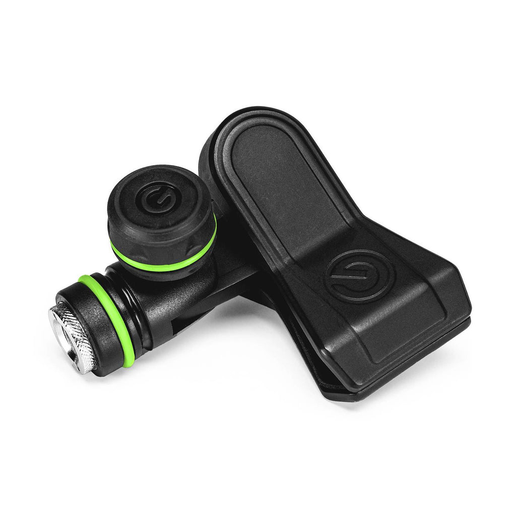 Gravity MSUCLMP universal adjustable microphone clip attached to a microphone stand, showcasing versatile microphone mounting accessory.