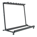 Xtreme GS807 7-way guitar stand holding multiple electric guitars with padded arms and sturdy black metal construction.