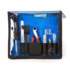 Groovetech Guitar Player Tech Kit with various guitar accessories, including tools and replacement parts for maintenance.