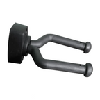 Hamilton KB919GBX guitar and ukulele hanger mounted on wall, showcasing sturdy stand for musical instrument storage