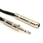 Hosa DOC-106 1/4 inch TRS male to 1/4 inch TS female cable for audio connections, showing the cable and connectors.