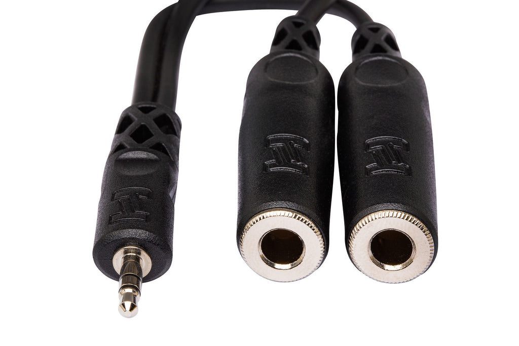 Hosa YMM-232 3.5mm TRS to dual 1/4 inch TRS Y cable for audio connections, showing the cable and connectors.