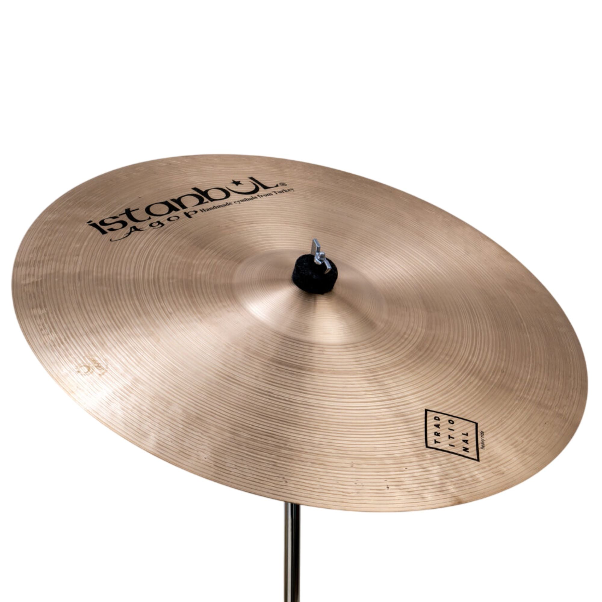 Istanbul Agop Istanbul 24 Heavy Ride cymbal with a traditional finish, featuring a large bell and complex surface texture.