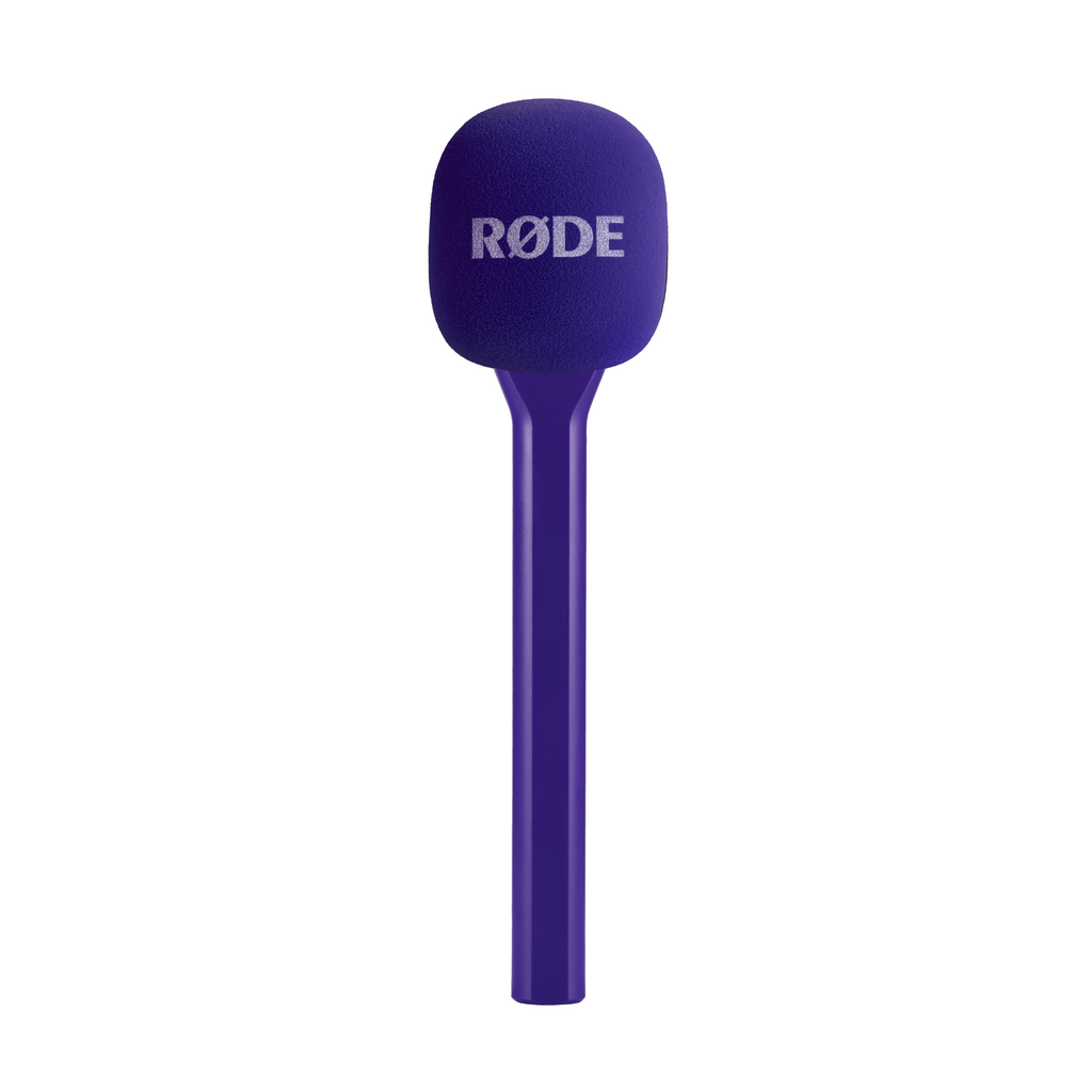RODE Interview GO handheld adaptor for Wireless GO microphone system, purple color, compact microphone accessory in close-up view.