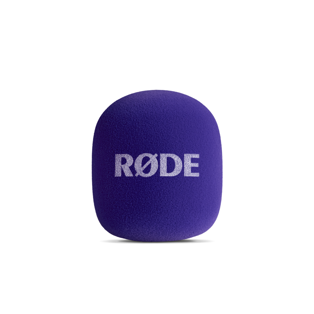 Rode Interview GO handheld adaptor for Wireless GO microphone system, purple color, designed for professional audio recording.