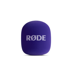 Rode Interview GO purple handheld adapter for Wireless GO microphone system, shown with microphone attachment and controls.