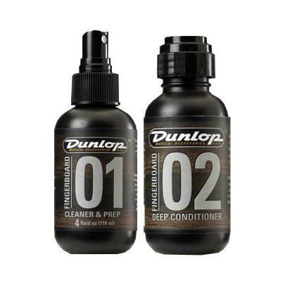 Dunlop J6502 guitar fingerboard care kit with cleaning cloth, polish, and tools for guitar maintenance.