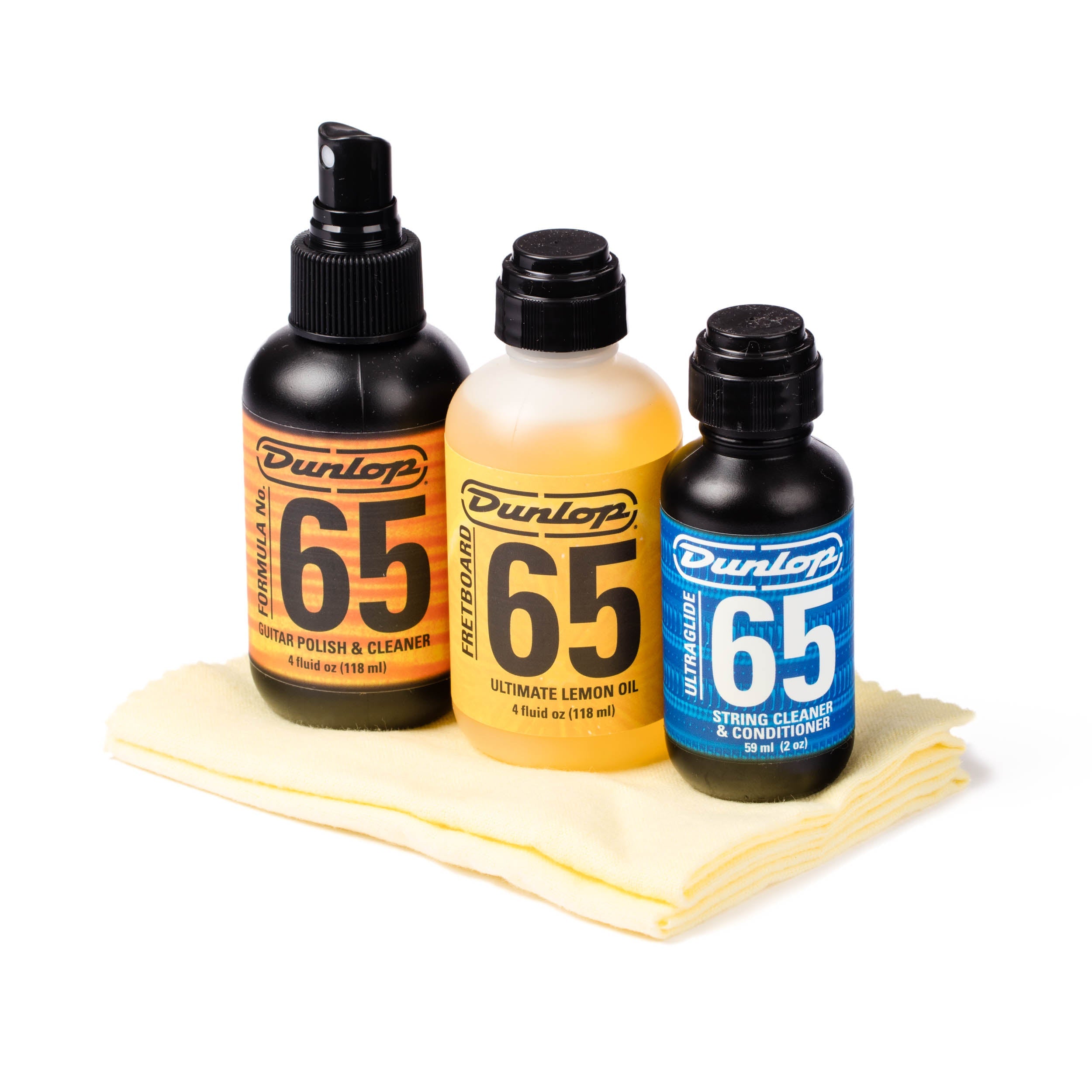 Jim Dunlop System 65 Guitar Tech Kit containing guitar polish, cleaning cloth, and tools for maintenance.
