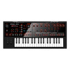 Roland JD-Xi interactive analogue digital crossover synthesizer keyboard with knobs and keys, black and compact design