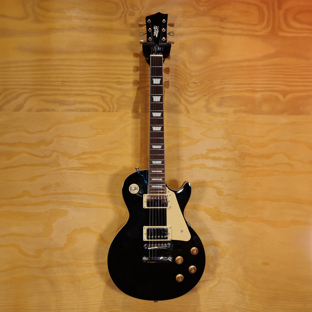 Black Jet JL-500 LP Style Electric Guitar from Jet Guitars, showing the sleek body and classic design against a neutral background.