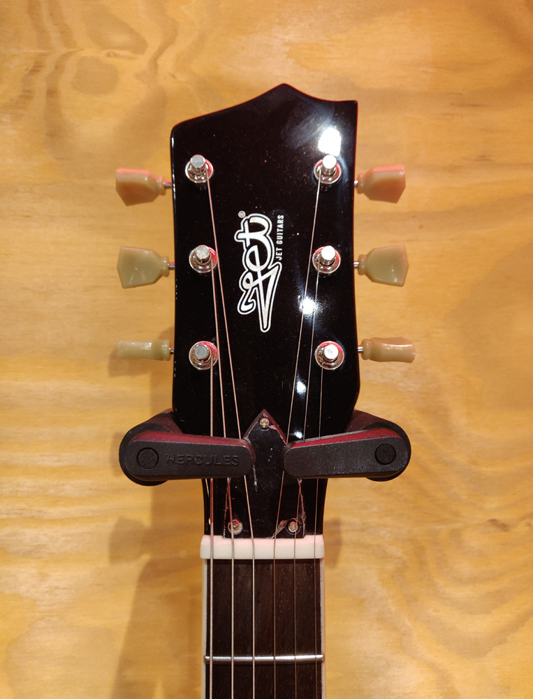 Black Jet JL-500 LP style electric guitar with a sleek finish and classic design, featuring dual humbucker pickups.
