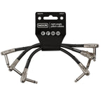 Set of three MXR JM506 6-inch guitar patch cables with black connectors and flexible cable for guitar pedal connections.