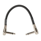 MXR JM506 6-inch guitar patch lead with black cable and connectors, designed for high-quality instrument connection.