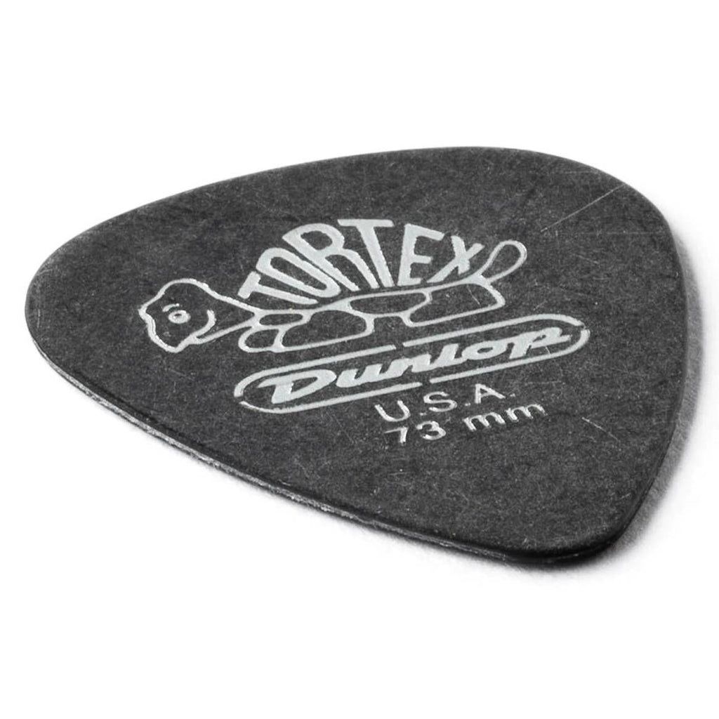 Jim Dunlop .73 Tortex Pitch Black guitar picks in a player pack, featuring durable black plastic picks for versatile playing.
