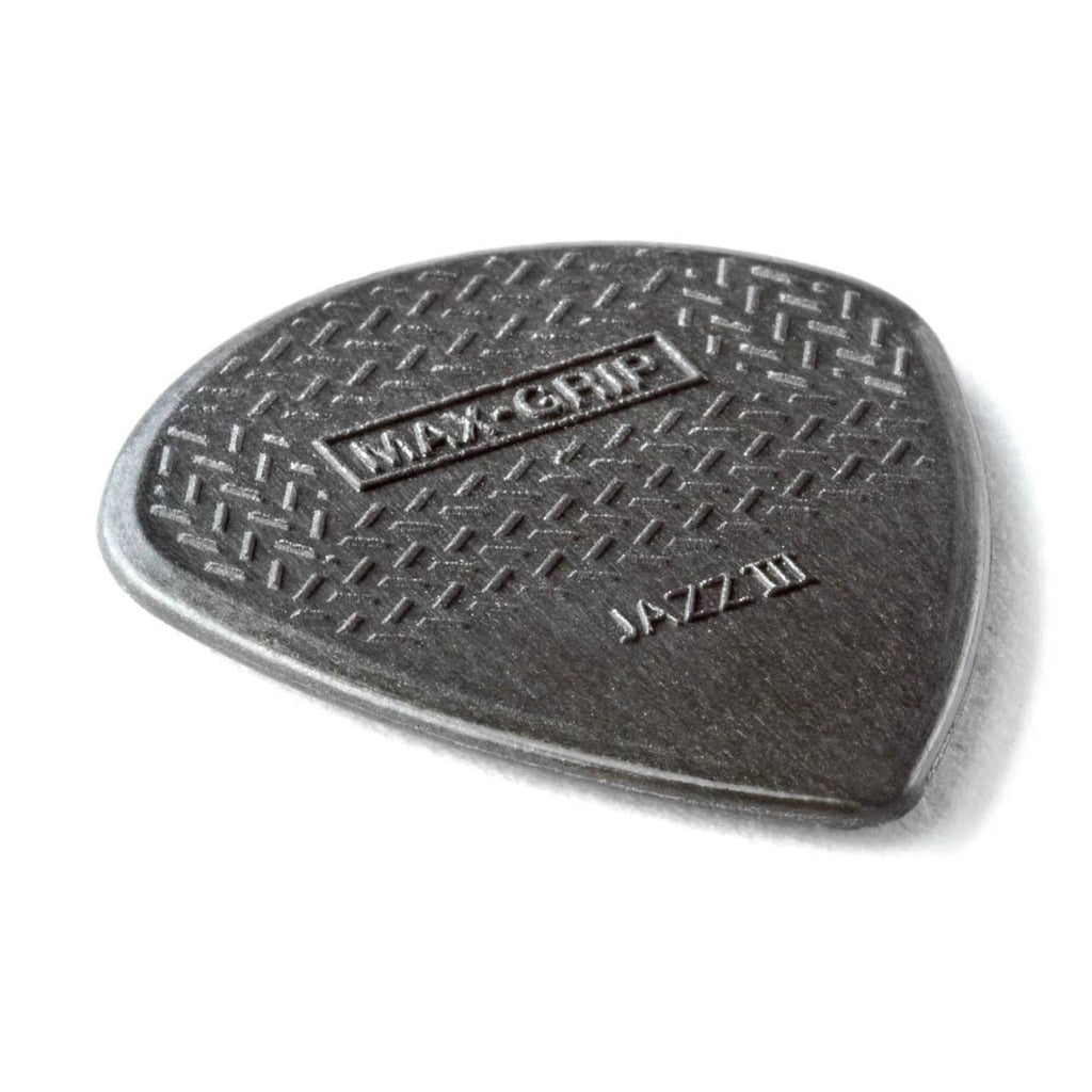 Dunlop Jazz III Maxgrip Carbon Fibre guitar picks in a player pack, showcasing black picks with textured grip and sharp tip.