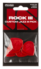 Six Dunlop Jim Dunlop JPRJ3 Rock III Nylon Jazz III guitar picks in a player's pack, showcasing the durable nylon material and unique shape.