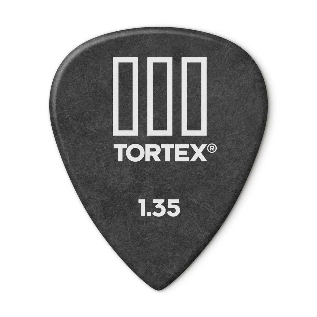 Jim Dunlop Tortex T3 1.35mm guitar picks, player’s pack of 12, shown in the image with various picks stacked and fanned out.