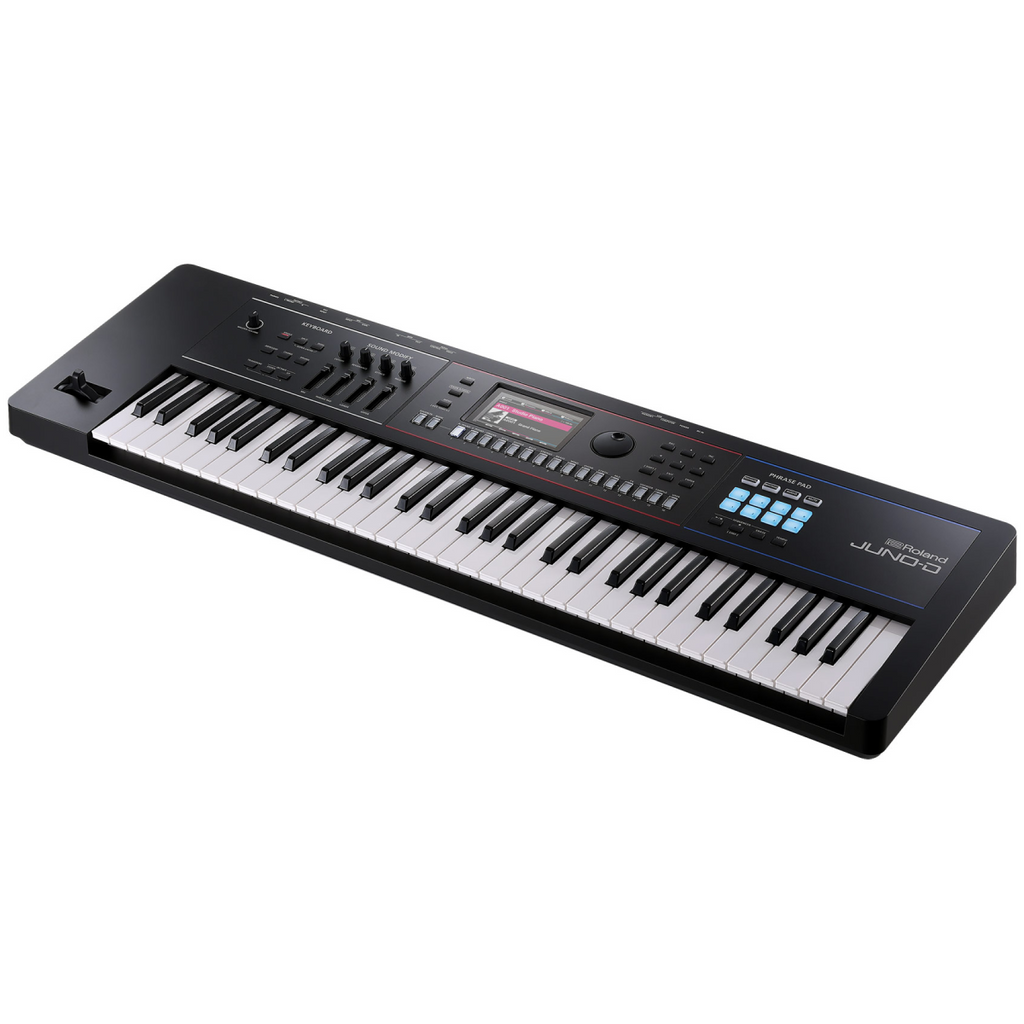 Roland JUNOD6 61-key synthesizer keyboard showing control knobs and keys in a music studio setting.