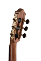 Katoh MCG110S classical acoustic guitar with a wooden body and nylon strings, shown in a close-up view.