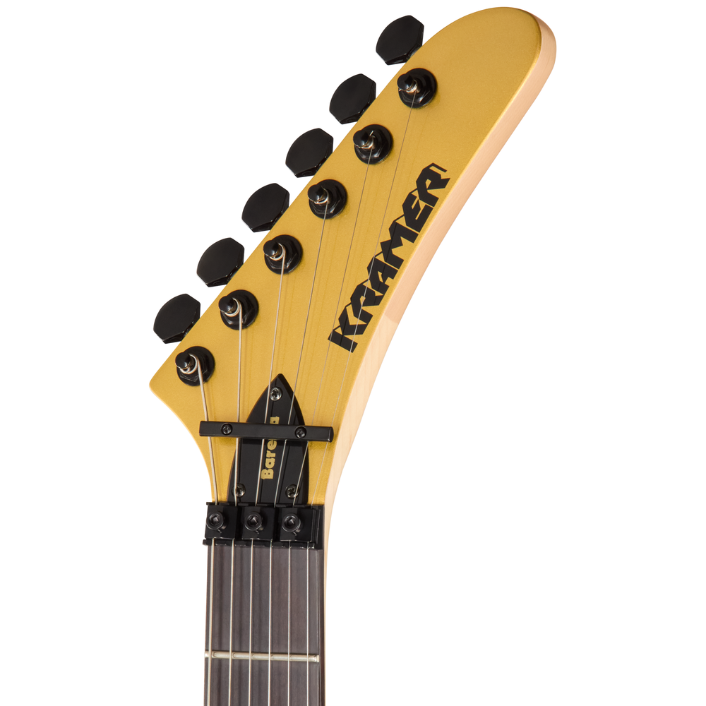 Kramer 50th Anniversary Baretta electric guitar in gold finish, showcasing its sleek body and distinctive design.