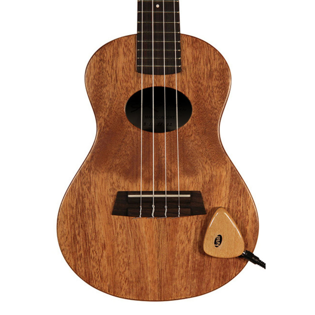 KNA AP-1 Piezo pickup attached to an acoustic guitar, showcasing its compact design and installation on the instrument.