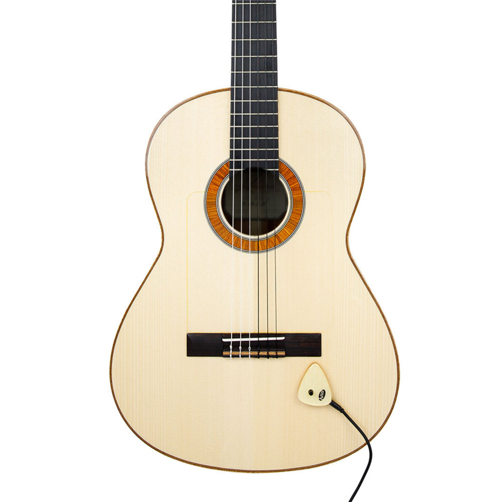 KNA AP2 acoustic guitar pickup with volume control mounted on guitar, featuring compact design and adjustable knob for sound tuning.