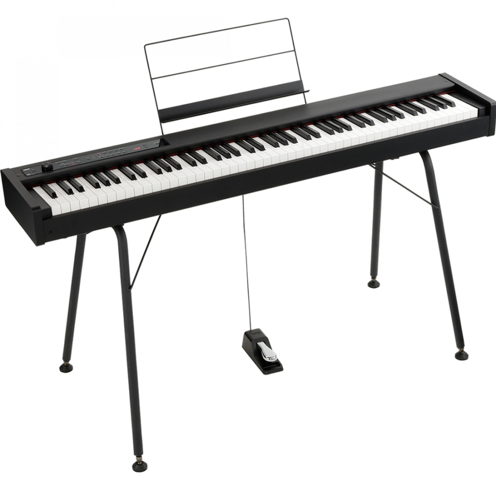 Korg D1 digital piano with 88 weighted hammer action keys, compact design, black finish, showing the keyboard and control panel.