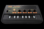 Korg Monotron Delay analog ribbon synthesizer featuring a compact design and delay effect controls.