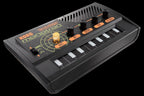 Korg Monotron Delay analog ribbon synthesizer showcasing its compact design and delay controls.