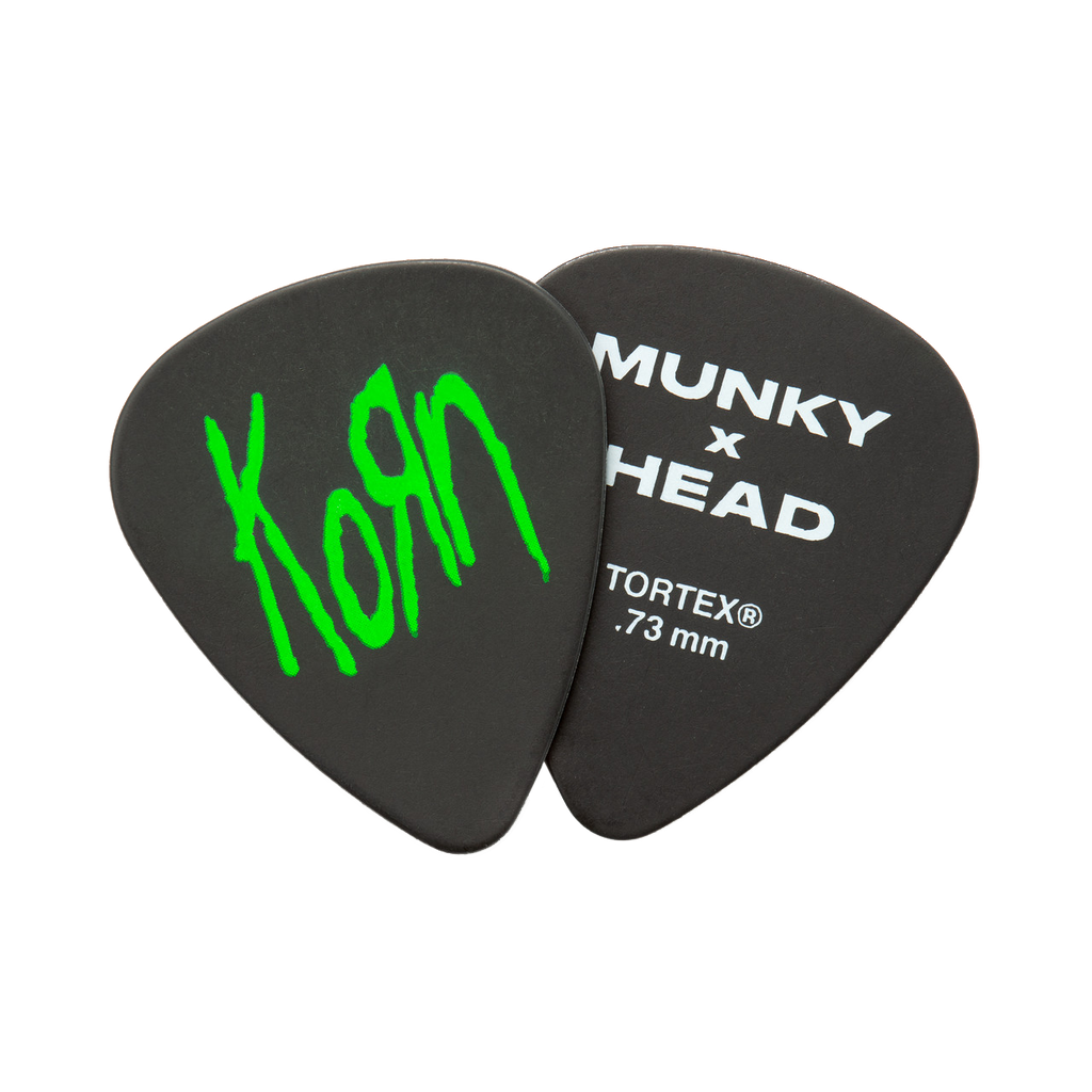 Jim Dunlop Korn Heavy Core Custom 7-string electric guitar strings with included picks, featuring black packaging and string details.