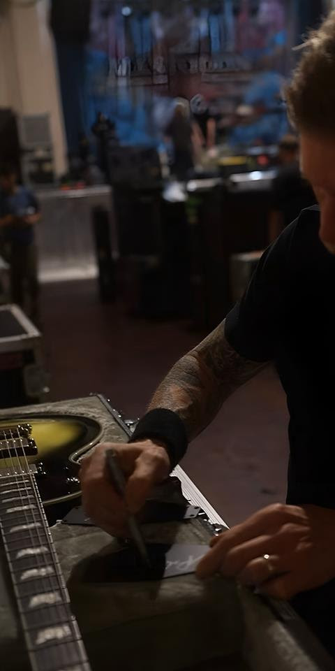 ESP LTD Bill Kelliher 600 Electric Guitar in Vintage Silver Sunburst with signature visible on the body.