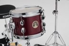 Tama Club-JAM Flyer 4-piece drum kit with hardware in Candy Apple Mist, includes 14", 8", 10" drums and a 10" snare drum.