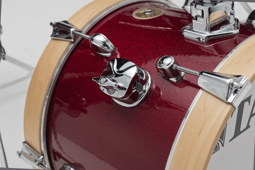 Tama Club-JAM Flyer 4-piece drum kit with hardware, including 14-inch bass, 10-inch toms, and 10-inch snare in Candy Apple Mist finish