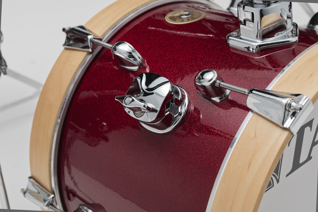 Tama Club-JAM Flyer 4-piece drum kit with hardware, including 14-inch bass, 10-inch toms, and 10-inch snare in Candy Apple Mist finish