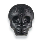 Black LP Sugar Skull shaker, a hand percussion instrument with a detailed sugar skull design, used for musical rhythm and accessories.