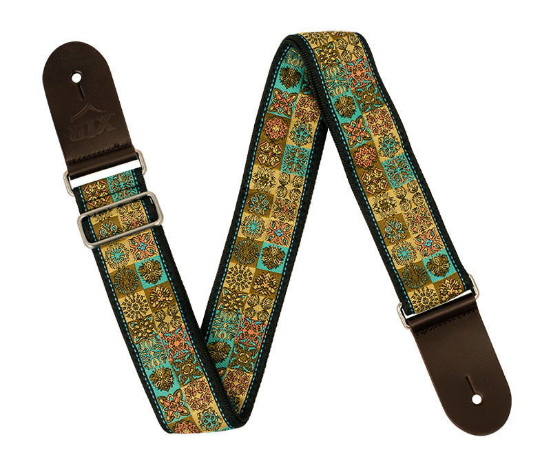 XTR Deluxe Woven Jacquard Poly Cotton Guitar Strap in Vintage Gold with intricate gold and brown woven patterns.