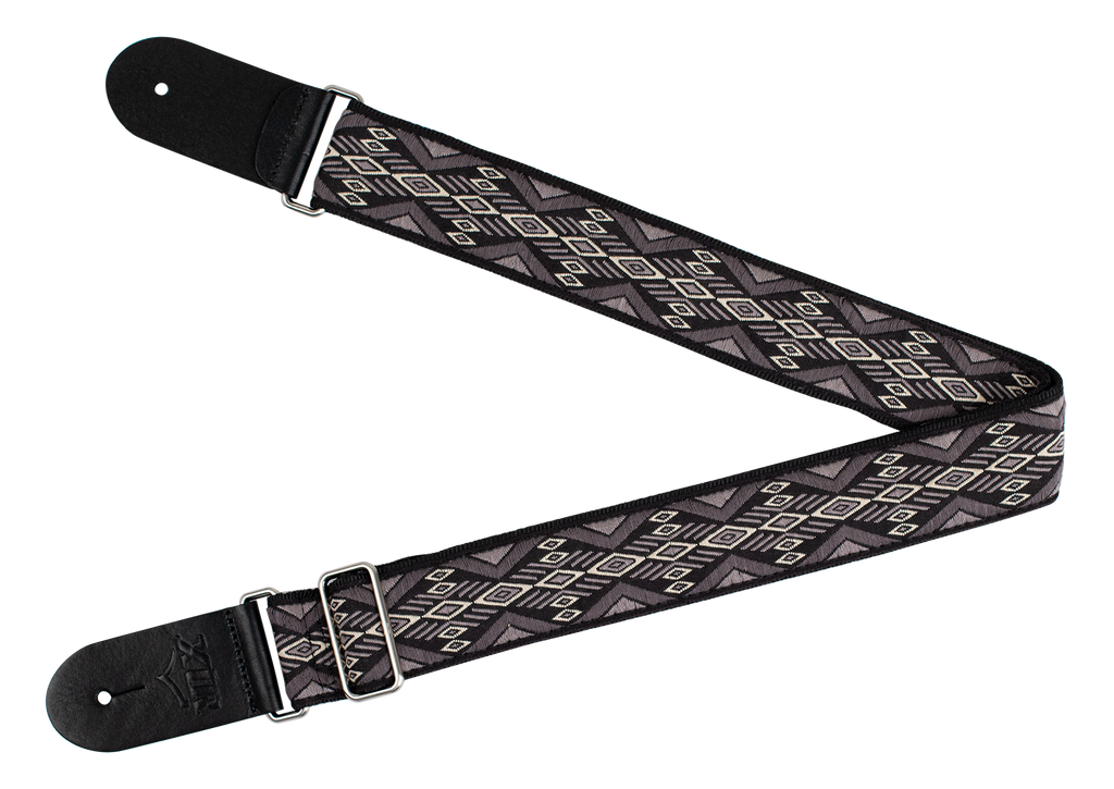 XTR Deluxe woven jacquard grey diamond guitar strap made of poly cotton with intricate woven pattern and adjustable strap design.