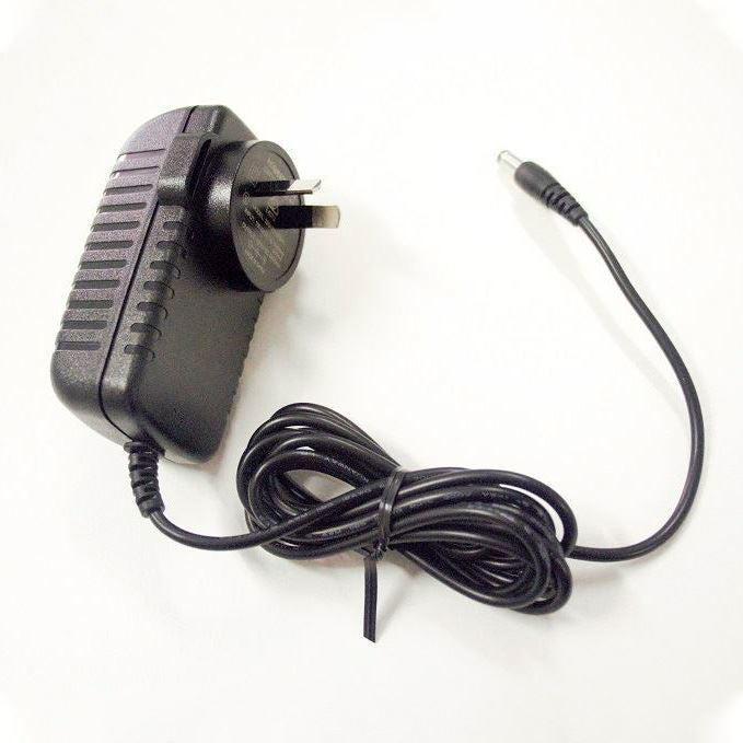 Yamaha 12V620 power supply adaptor for keyboards, compact black Yamaha keyboard power supply with cable connection.